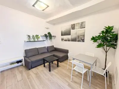 Coin salon dans l'établissement Heart of Paris Apartment