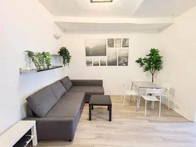 Coin salon dans l'établissement Heart of Paris Apartment