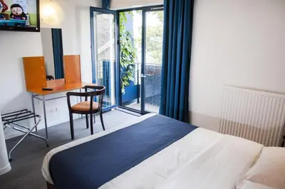 Un ou plusieurs lits dans un hébergement de l'établissement Solar Hotel
