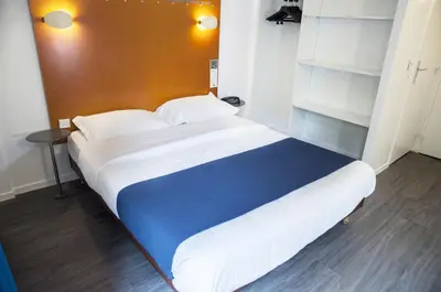 Un ou plusieurs lits dans un hébergement de l'établissement Solar Hotel