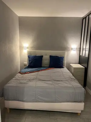 Un ou plusieurs lits dans un hébergement de l'établissement Cozy 2 pièces, 41 m2 in Boulogne Billancourt