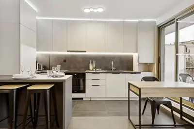 Cuisine ou kitchenette dans l'établissement Magnifique appartement luxueux au coeurs de Paris