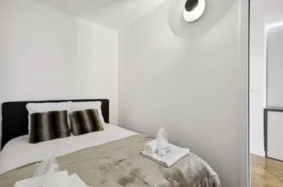 Un ou plusieurs lits dans un hébergement de l'établissement Magnifique appartement luxueux au coeurs de Paris
