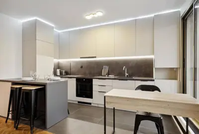 Cuisine ou kitchenette dans l'établissement Magnifique appartement luxueux au coeurs de Paris
