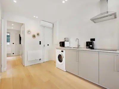Cuisine ou kitchenette dans l'établissement Cosy apartment in Sentier