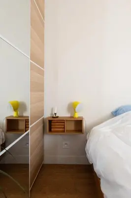 Un ou plusieurs lits dans un hébergement de l'établissement Charming & bright apartment with rolling balcony