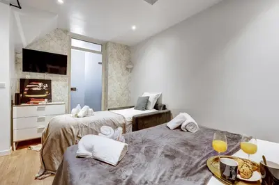 Un ou plusieurs lits dans un hébergement de l'établissement TBS 334 - Nice apartment in Paris