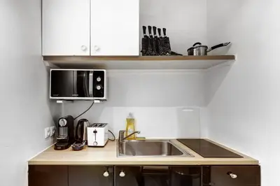 Cuisine ou kitchenette dans l'établissement TBS 334 - Nice apartment in Paris