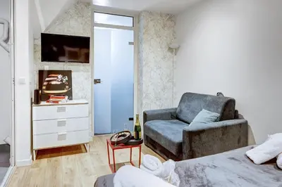 Télévision ou salle de divertissement dans l'établissement TBS 334 - Nice apartment in Paris