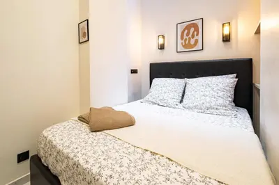 Un ou plusieurs lits dans un hébergement de l'établissement 5 Guests Flat - Marais Enfants Rouges