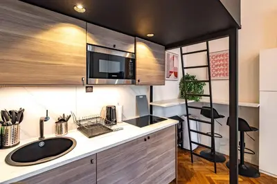 Cuisine ou kitchenette dans l'établissement 5 Guests Flat - Marais Enfants Rouges