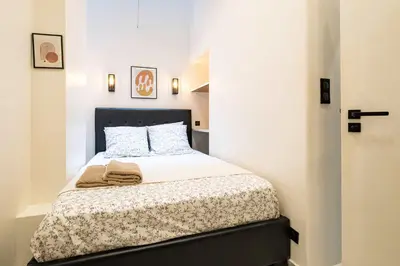 Un ou plusieurs lits dans un hébergement de l'établissement 5 Guests Flat - Marais Enfants Rouges
