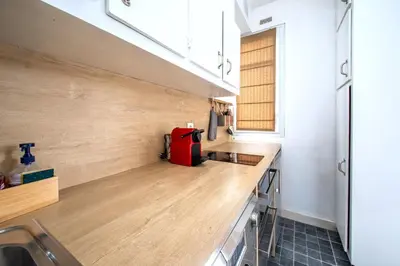 Cuisine ou kitchenette dans l'établissement Studio cosy et équipé Paris 17 - II