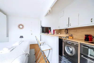 Cuisine ou kitchenette dans l'établissement Studio cosy et équipé Paris 17 - II