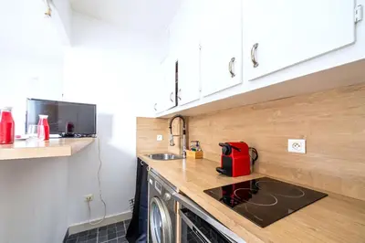 Cuisine ou kitchenette dans l'établissement Studio cosy et équipé Paris 17 - II