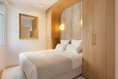 Un ou plusieurs lits dans un hébergement de l'établissement Pick A Flat's Apartments in Opéra - Rue La Fayette