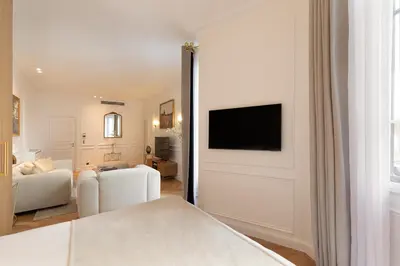Télévision ou salle de divertissement dans l'établissement Pick A Flat's Apartments in Opéra - Rue La Fayette