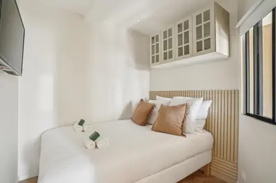 Un ou plusieurs lits dans un hébergement de l'établissement Lavie Maison AC Fontaine