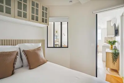 Un ou plusieurs lits dans un hébergement de l'établissement Lavie Maison AC Fontaine