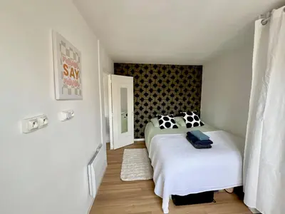 Un ou plusieurs lits dans un hébergement de l'établissement Lovely Place Le Marais Central Paris