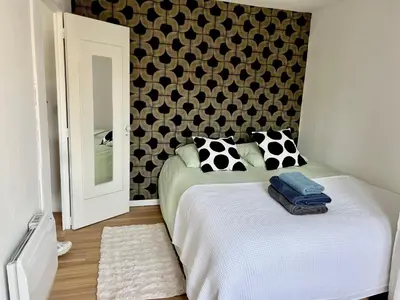 Un ou plusieurs lits dans un hébergement de l'établissement Lovely Place Le Marais Central Paris