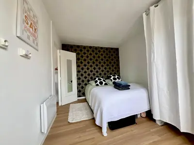 Un ou plusieurs lits dans un hébergement de l'établissement Lovely Place Le Marais Central Paris