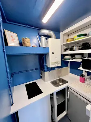 Cuisine ou kitchenette dans l'établissement Lovely Place Le Marais Central Paris