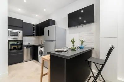 Cuisine ou kitchenette dans l'établissement Charmant appartement 6 couchages