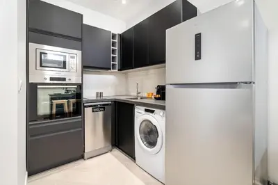 Cuisine ou kitchenette dans l'établissement Charmant appartement 6 couchages