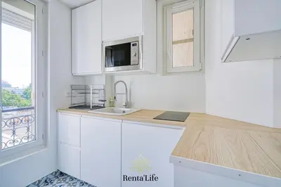 Cuisine ou kitchenette dans l'établissement Asnièrois Gambetta - Studio - 10min Paris