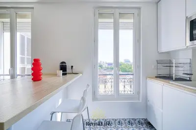 Cuisine ou kitchenette dans l'établissement Asnièrois Gambetta - Studio - 10min Paris