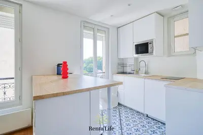 Cuisine ou kitchenette dans l'établissement Asnièrois Gambetta - Studio - 10min Paris