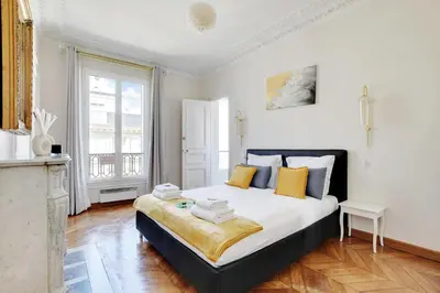 Un ou plusieurs lits dans un hébergement de l'établissement Modern Apartment - 2BD 4P - Louvre Marais