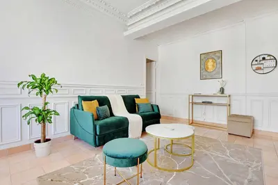 Coin salon dans l'établissement Modern Apartment - 2BD 4P - Louvre Marais