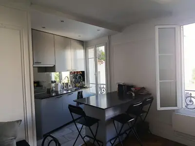 Cuisine ou kitchenette dans l'établissement Appartement idéal pour visiter Paris