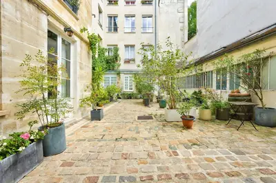 Jardin de l'établissement GuestReady - Charming nest in the city centre