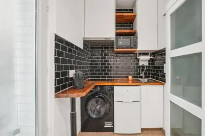 Cuisine ou kitchenette dans l'établissement Magnifique studio rénové métro Paris 2pers