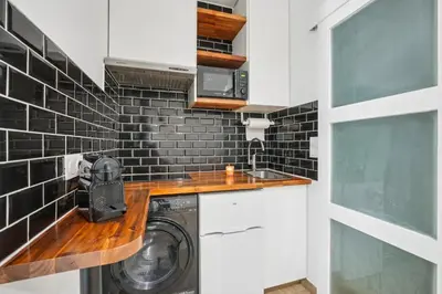 Cuisine ou kitchenette dans l'établissement Magnifique studio rénové métro Paris 2pers