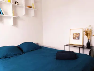 Un ou plusieurs lits dans un hébergement de l'établissement Sweet modern cocoon down Montmartre