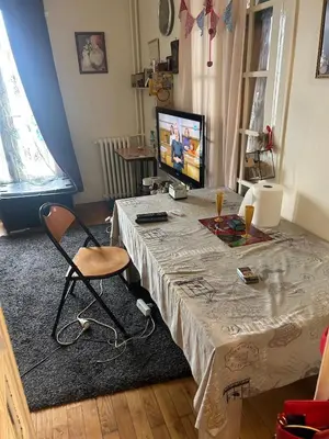 Télévision ou salle de divertissement dans l'établissement Family apartment in Paris
