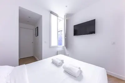 Un ou plusieurs lits dans un hébergement de l'établissement Apartement 4 stars in Levallois , near Paris 17th district