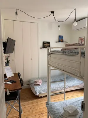 Un ou plusieurs lits dans un hébergement de l'établissement Paris 75014, France