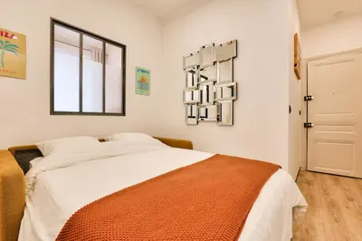 Un ou plusieurs lits dans un hébergement de l'établissement Charming& cozy flat - Montmartre Sacré Coeur