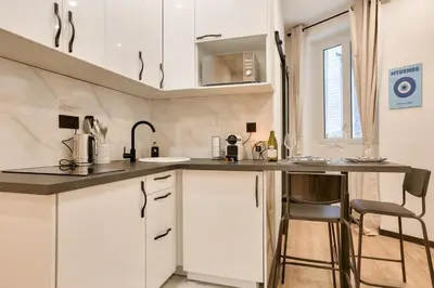 Cuisine ou kitchenette dans l'établissement Charming& cozy flat - Montmartre Sacré Coeur