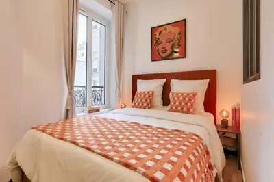 Un ou plusieurs lits dans un hébergement de l'établissement Charming& cozy flat - Montmartre Sacré Coeur