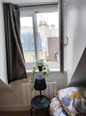 Un ou plusieurs lits dans un hébergement de l'établissement Nice studio best location