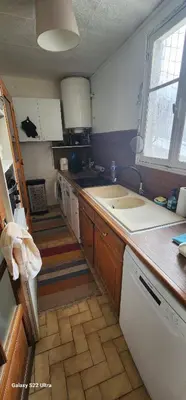 Cuisine ou kitchenette dans l'établissement Montmartre relax