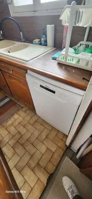 Cuisine ou kitchenette dans l'établissement Montmartre relax