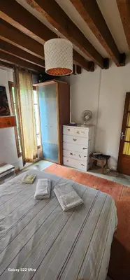Un ou plusieurs lits dans un hébergement de l'établissement Montmartre relax