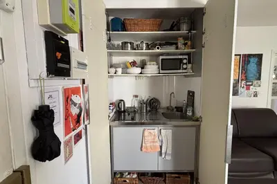 Cuisine ou kitchenette dans l'établissement Studio for 2 - near Louvre Museum